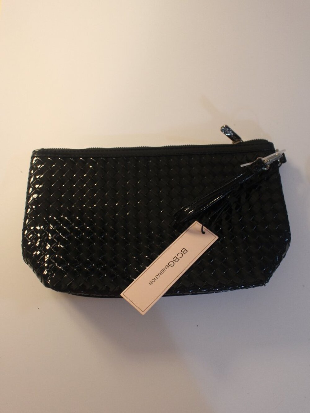 BCBGeneration Black Glossy Woven Zip Wristlet With Tag